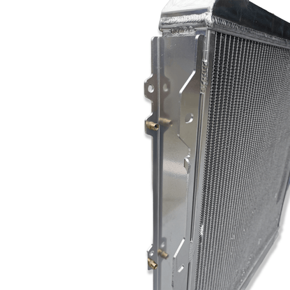 Left side profile of the all-aluminum radiator for the Toyota 4Runner 1KZ-TE, highlighting the robust TIG-welded tank construction for off-road use.