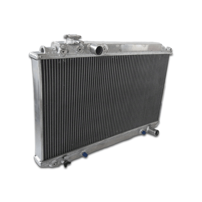 Left side profile of the all-aluminum radiator for the 7M-GE powered Cressida MX83, highlighting the TIG-welded end tank and main coolant hose connections.