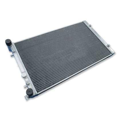 Left side profile of the dual pass radiator for the VW Golf MK4, highlighting the unique same-side inlet/outlet for dual pass efficiency.