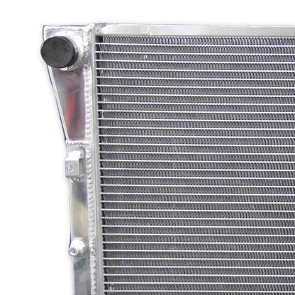 Close-up detail shot of the TIG-welded seams and high-pressure radiator cap on the 3-row performance radiator for the 1994-1996 Chevy Impala.