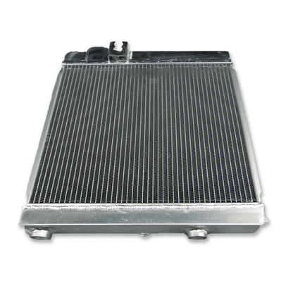 Rear view of the aluminum radiator for the BMW E30 M3, showing the direct-fit mounting points for the S14-powered chassis.