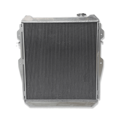 Rear view of the 3-row aluminum radiator for the Toyota 4Runner KZN130, showing the integrated automatic transmission cooler ports for AT/MT.