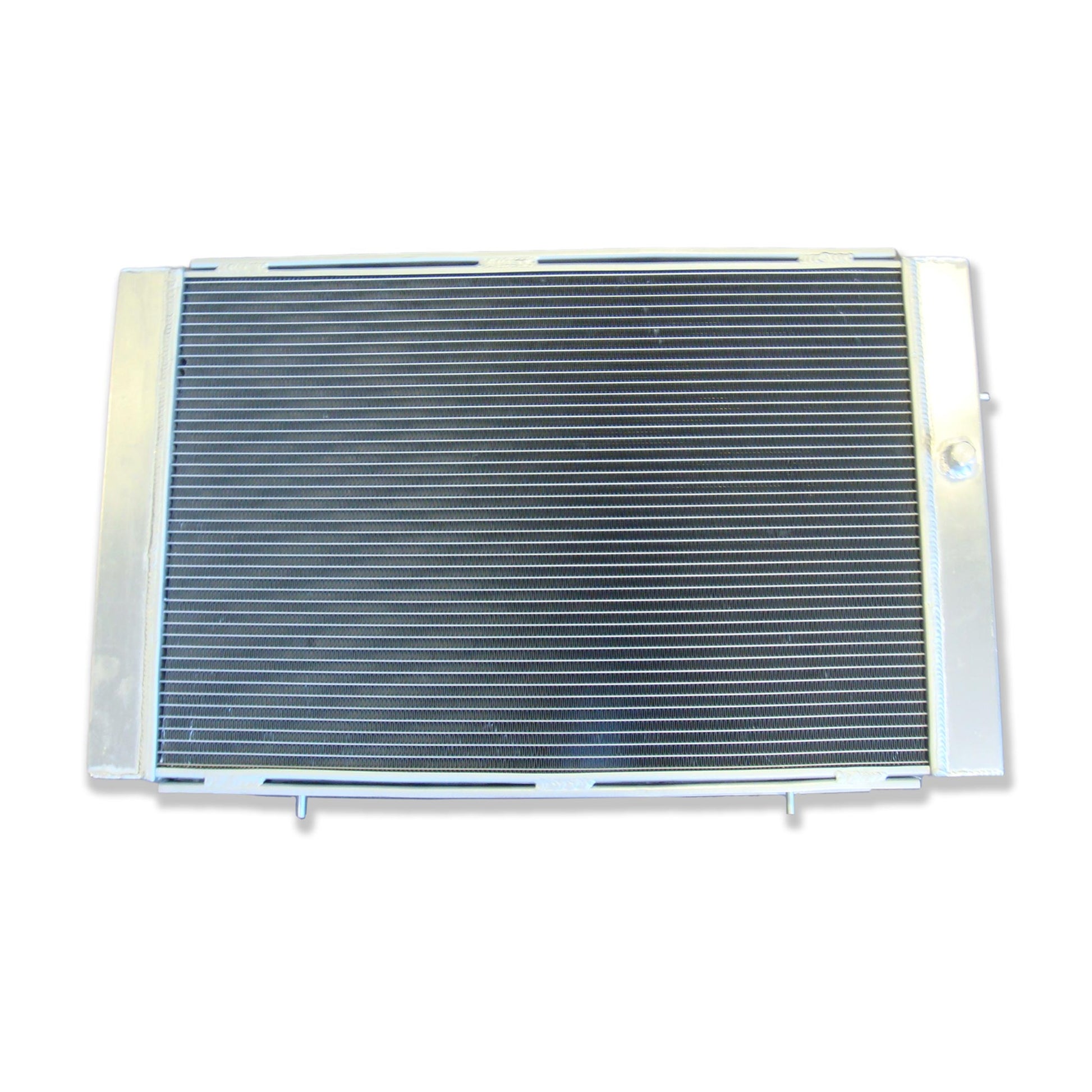 Rear view of the 3-row aluminum radiator for a Holden WB V8, showing the integrated automatic transmission cooler ports for universal AT/MT fit.