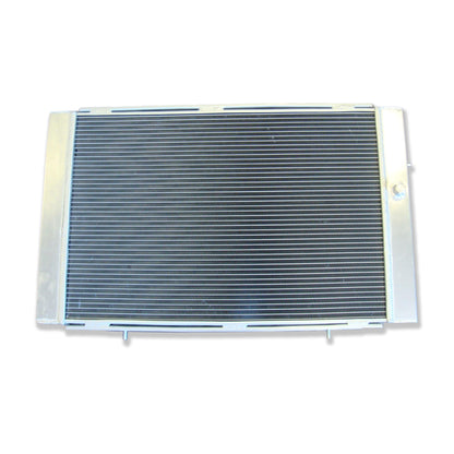 Rear view of the 3-row aluminum radiator for a Holden WB V8, showing the integrated automatic transmission cooler ports for universal AT/MT fit.