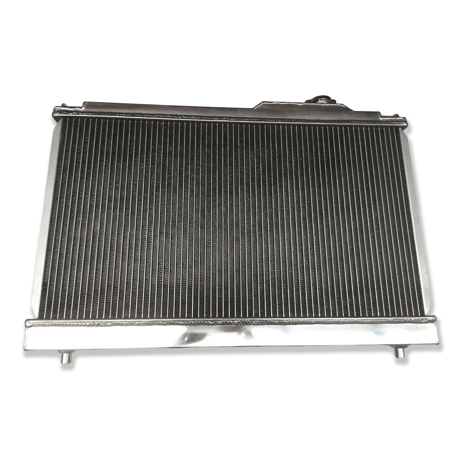 Rear view of the aluminum radiator for the Celica ST205 GT-Four, showing the direct-fit mounting points for manual transmission models.