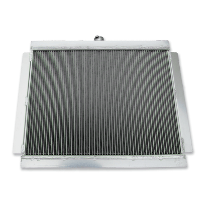 Rear view of the aluminum radiator for the Datsun 280Z and 280ZX Fairlady Z, detailing the mounting points and hose connections for a direct-fit MT installation.