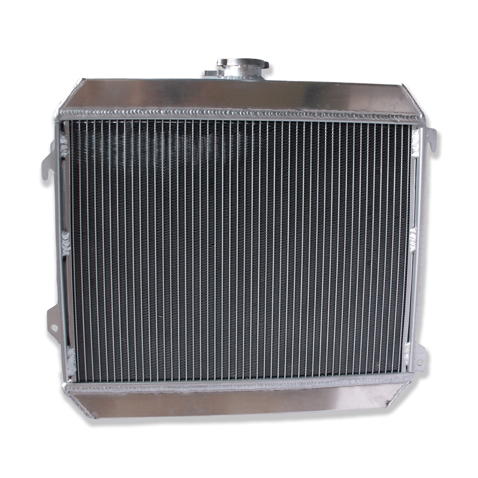 Rear view of the aluminum radiator for classic Datsun cars and trucks with an L20B swap, showing direct-fit MT mounting points.