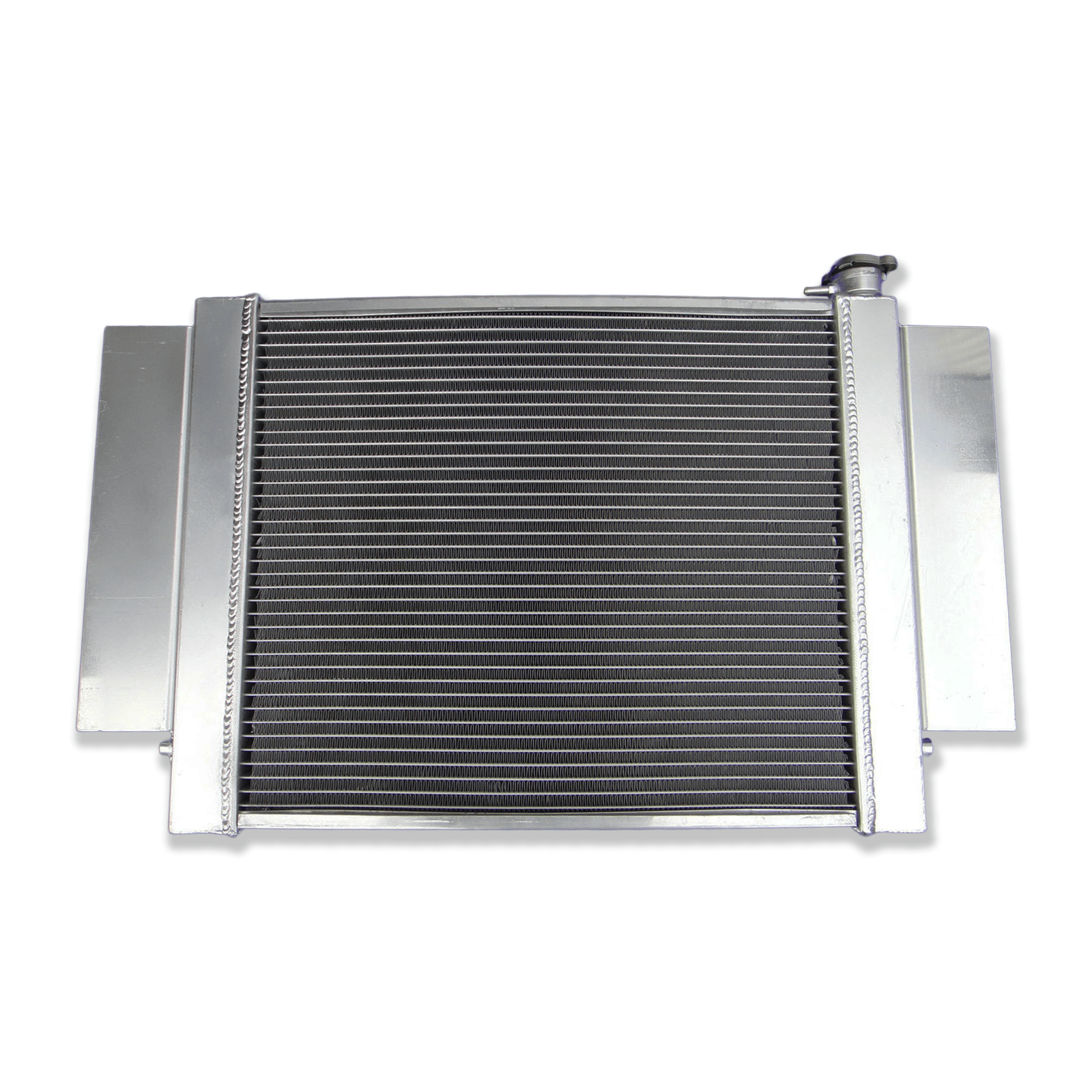 Rear view of the Mazda RX-series S1/S2 aluminum radiator, detailing the integrated heater pipe connection and precise mounting points for a direct-fit installation.