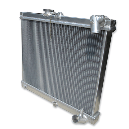Right side of the lightweight 3-row MT radiator for the RX-7 FC3S, showcasing its efficient core for superior rotary cooling.