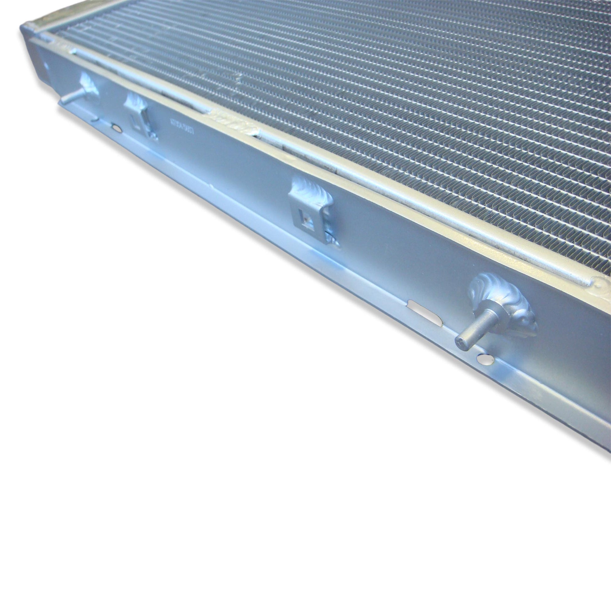 Top-down view of the 3-row radiator for a Holden WB V8, displaying the high-pressure cap and triple-core design.