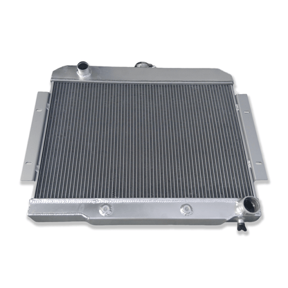 Top-down view of the radiator for a Jeep CJ V8 conversion, displaying the high-pressure cap and heavy-duty construction.